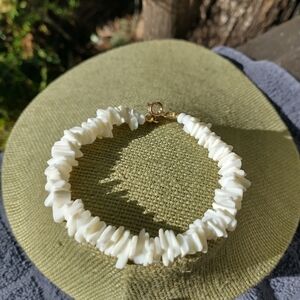 Women's white shell bracelet.